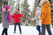 © Syda Productions - happy friends playing snowball in winter forest
