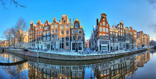 Beautiful Early Morning Winter Panorama Of The Unesco World Heritage City Canals Of Amsterdam, The Netherlands. 