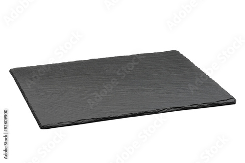 Fotografía Empty black slate plate isolated on white background