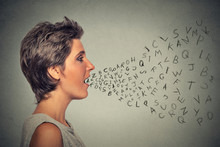 Woman Talking With Alphabet Letters Coming Out Of Her Mouth