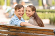© Viacheslav Yakobchuk - Nice young couple sitting on the bench