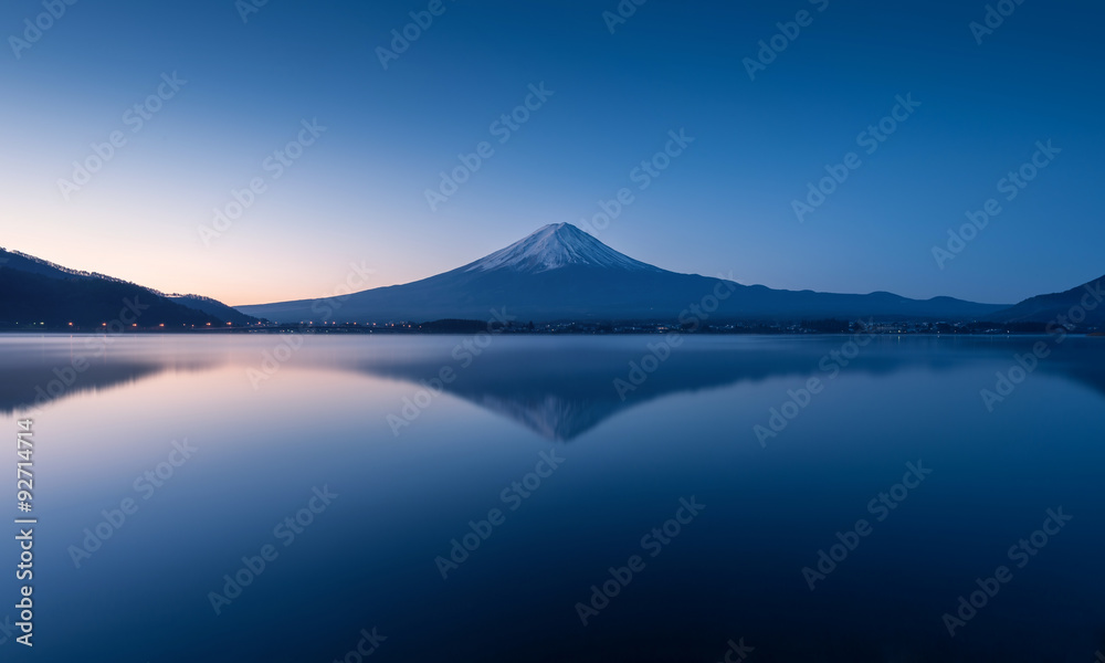 mountain Fuji at dawn with peaceful lake reflection - obrazy, fototapety, plakaty 