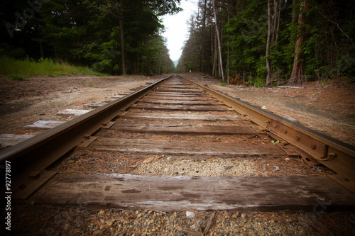 Fotografía Old railroad tracks with vintage texture effect