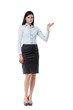 © ImageFlow - Full length brunette girl in a formal clothes is pointing out something by her hand. Isolated on white.