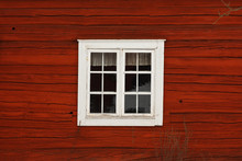 Old-fashioned Cottage Painted In Swedish Traditional Red Color.