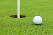 © enjoynz - Golf ball on green