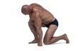 Athlete exercising while kneeling down