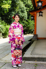 Wall Mural - Japanese woman in temple