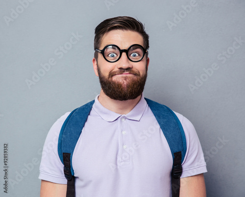 Fotomural Portrait of a male nerd with funny face