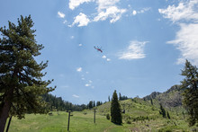Helicopter In Mountains