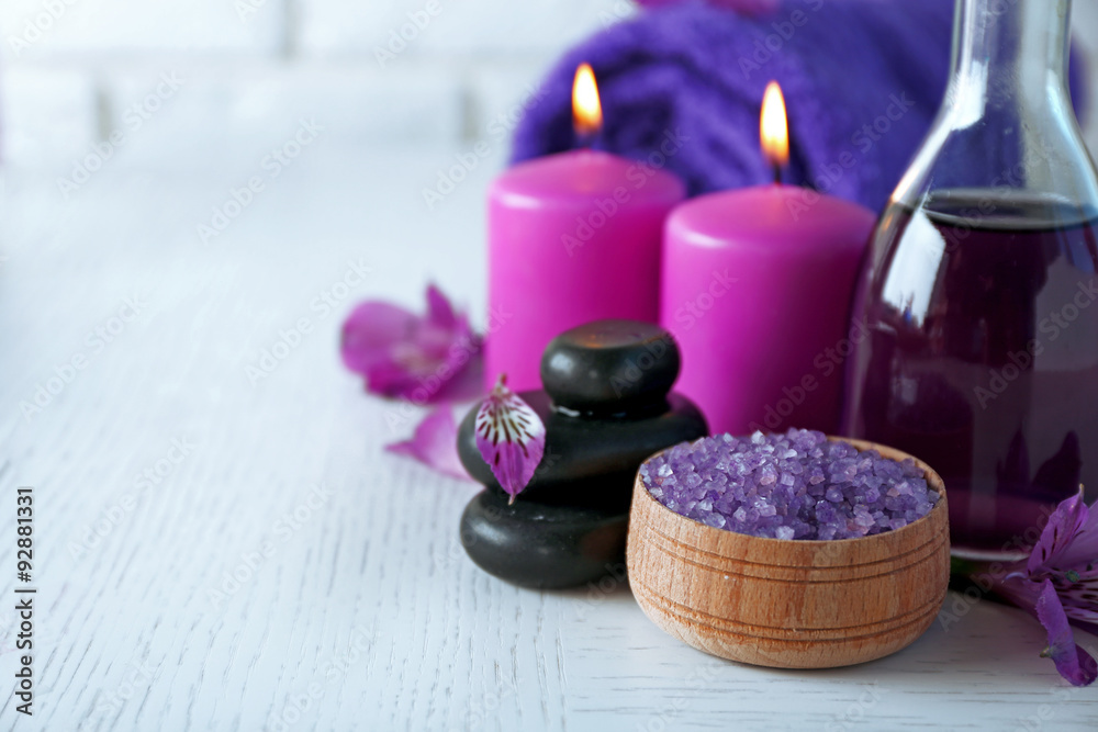 Beautiful composition of spa treatment on white wooden table