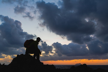 Man silhouette backpacker, inspirational ocean landscape