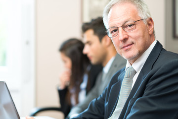 Smiling businessman portrait