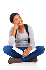 Wall Mural - young female college student looking up