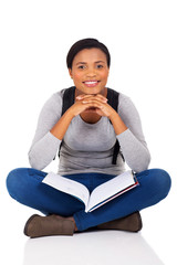 Wall Mural - african college student relaxing on the floor