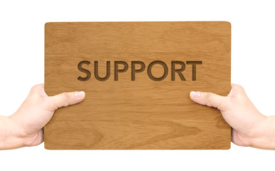 Aufkleber - Hand holding dark brown wood signboard with support word isolate