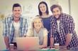 © WavebreakmediaMicro - Portrait of smiling colleagues working on laptop