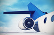 © artegorov3@gmail - private aircraft jet engine with a part of a wing on sky backgro