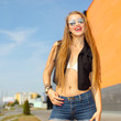 © ruslimonchyk - funny cute smiling woman. Beautiful laughing girl . Free woman enjoying freedom feeling happy. Hipster girl showing happy positive emotions on the background of the shopping center