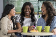 Three ethnically diverse young woman sharing a cell phone in a cafe