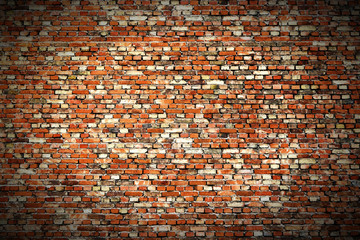 Wall Mural - Background of red, tiny bricks texture. Vignette.