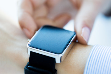 Sticker - close up of hands setting smart watch