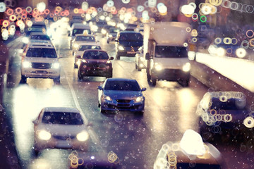 Wall Mural - Snow in the city night traffic road transport