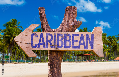 Caribbean arrow with beach background Tableau sur Toile