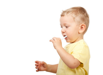 Fototapete - child brushing teeth