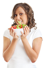 Wall Mural - Young woman eating healhty salad