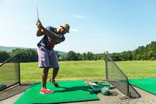 Golf Practice At The Driving Range