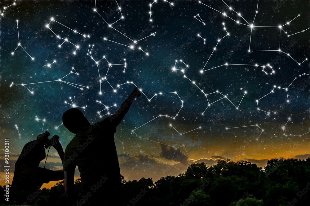 Astrology concept. Constellations on night sky. Silhouettes of astrologers observing zodiac constellation. - obrazy, fototapety, plakaty 