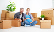 © JenkoAtaman - moving to  new apartment. family pregnant wife and husband with