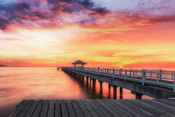 Landscape of Wooded bridge in the port between sunrise