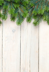 Poster - Christmas wooden background with fir tree