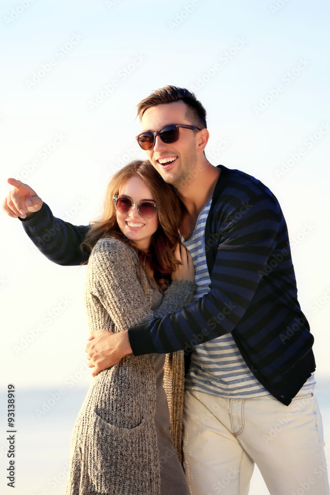 Young couple on the riverside