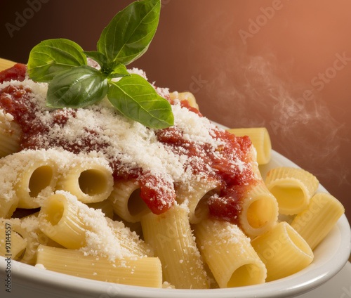 Fototapeta na wymiar dish with macaroni and tomato sauce