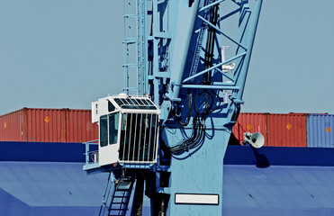 Wall Mural - Port crane on the quay with cargo ship 