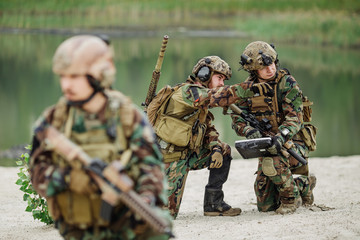 Wall Mural -  Army soldiers during the military operation