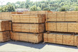 stacked piles of timber product