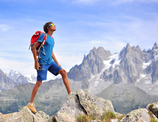 Wall Mural - Young man in mountains