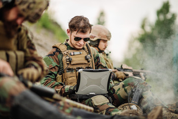 ranger using laptop outdoors