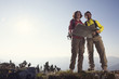 © Westend61 - Austria, Tyrol, couple standing with map at Unterberghorn