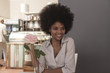 © Westend61 - Young woman waiting in cafe
