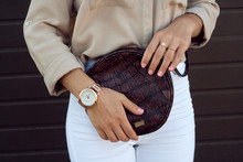 Trendy Girl Holding Small Brown Leather Bag Handbag