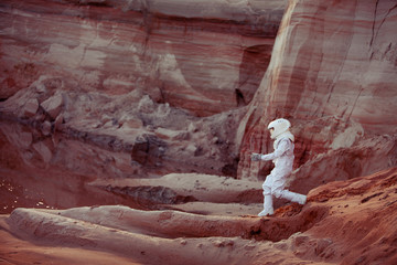 Wall Mural - Water on Mars, futuristic astronaut, image with the effect of