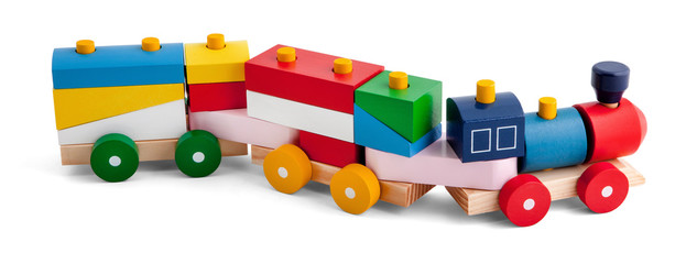wooden toy train with colorful blocs isolated over white