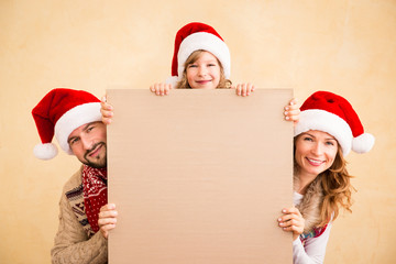 Canvas Print - Family holding Christmas poster