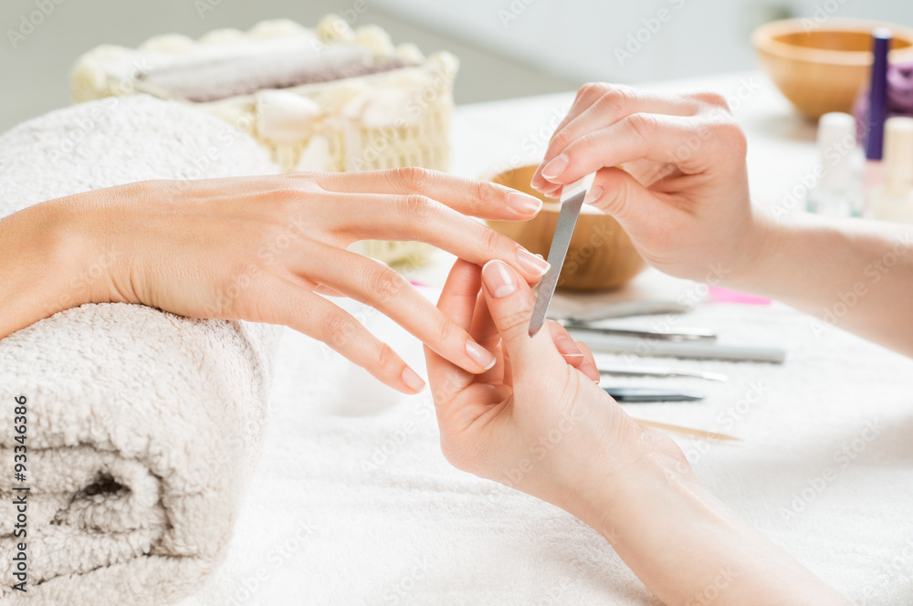 Manicure treatment at nail salon - obrazy, fototapety, plakaty 