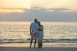 © Darren Baker - Senior Couple at Sunset Tropical Beach